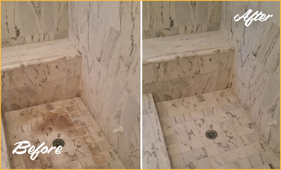 Before and After Picture of a Murray Marble Shower Honed to Remove Dark Stains